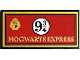 Part No: 87079pb1180  Name: Tile 2 x 4 with Gold 'HOGWARTS EXPRESS', Crest, and Black '9¾' on White Circle on Red Background with Border Pattern (Sticker) - Set 76405