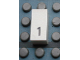 Part No: Mx1021Apb21  Name: Modulex, Tile 1 x 2 with Black Calendar Day Number  '1' Pattern