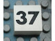 Part No: Mx1022Apb140  Name: Modulex, Tile 2 x 2 (no Internal Supports) with Black Calendar Week Number 37 Pattern