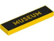 Part No: 2431pb875  Name: Tile 1 x 4 with 'MUSEUM' on Black Background Pattern
