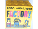 Part No: 30144pb414  Name: Brick 2 x 4 x 3 with LEGOLAND Japan, Black, Dark Pink, Medium Blue, and White 'FACTORY' and Machine Pattern