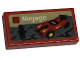 Part No: 3069pb1094  Name: Tile 1 x 2 with LEGO Ninjago Set Box Art, Black Ninja Minifigure Silhouette and Red Car Pattern (Sticker) - Set 40574