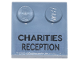 Part No: 33909pb016  Name: Tile, Modified 2 x 2 with Studs on Edge with Black 'CHARITIES RECEPTION' Pattern (Sticker) - Set 76271