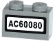 Part No: 3004pb135  Name: Brick 1 x 2 with 'AC60080' Pattern (Sticker) - Set 60080
