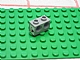 Part No: 32000pb003  Name: Technic, Brick 1 x 2 with Holes with Black Digger Bucket and Red Curved Arrow Down on White Background Pattern (Sticker) - Set 8459