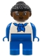 Minifig No: 4555pb186b Name: Duplo Figure, Female, Blue Legs, White Top with Blue Sleeves and Scarf, Black Curly Hair in Bun, Brown Head, Looking Right Minifig No: 4555pb186b Name: Duplo Figure, Female, Blue Legs, White Top with Blue Sleeves and Scarf, Black Curly Hair in Bun, Brown Head, Looking Right