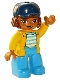 Minifig No: 47394pb266  Name: Duplo Figure Lego Ville, Female, Dark Azure Legs, White Top with Medium Azure Stripes and Yellow Jacket, Reddish Brown Hair and Dark Blue Cap