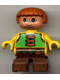 Minifig No: 6453pb009 Name: Duplo Figure, Child Type 2 Boy, Brown Legs, Green Vest with Brown Straps and Belt with Sash Minifig No: 6453pb009 Name: Duplo Figure, Child Type 2 Boy, Brown Legs, Green Vest with Brown Straps and Belt with Sash