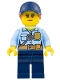 Minifig No: cty0992  Name: Police - City Officer Female, Bright Light Blue Shirt with Badge and Radio, Dark Blue Legs, Dark Blue Cap with Dark Orange Ponytail