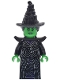 Minifig No: wck013 Name: Elphaba - Minifigure, Black Coat over Dress, Hat, Shoulder Pads Minifig No: wck013 Name: Elphaba - Minifigure, Black Coat over Dress, Hat, Shoulder Pads