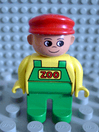 Duplo Figure, Male, Green Legs, Yellow Top with Green Overalls, Red Cap (Zoo Keeper)