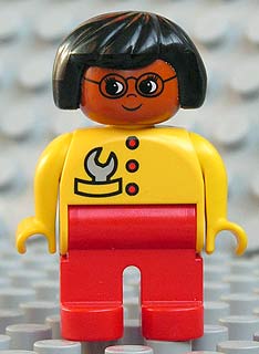 Duplo Figure, Female, Red Legs, Yellow Top with Red Buttons & Wrench in Pocket, Black Hair, Glasses, Brown Head