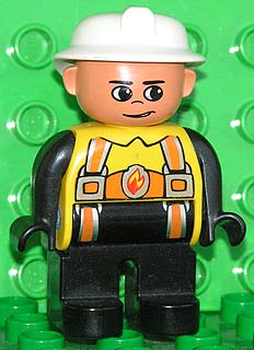 Duplo Figure, Male Fireman, Black Legs, Yellow Top with Flame and Orange Suspenders, White Fire Helmet, no Moustache