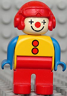 Duplo Figure, Male Clown, Red Legs, Yellow Top with 2 Buttons, Blue Arms, Red Aviator Helmet