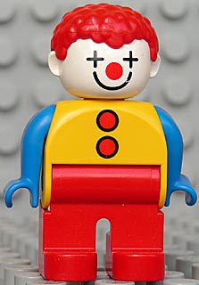Duplo Figure, Male Clown, Red Legs, Yellow Top with 2 Buttons, Blue Arms, Red Hair Curly
