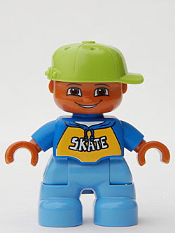 Duplo Figure Lego Ville, Child Boy, Medium Blue Legs, Blue Top with 'SKATE' Text Pattern, Lime Cap