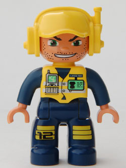 Duplo Figure Lego Ville, Male, Dark Blue Legs & Jumpsuit with Yellow Vest, Radio, ID Badge, Yellow Cap with Headset, Wide Smile