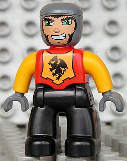 Duplo Figure Lego Ville, Male Castle, Black Legs, Red Chest, Bright Light Orange Arms, Dark Bluish Gray Hands, Wide Grin