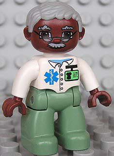 Duplo Figure Lego Ville, Male Medic, Sand Green Legs, White Top with Badge, Light Bluish Gray Hair, Brown Head, Glasses, Moustache