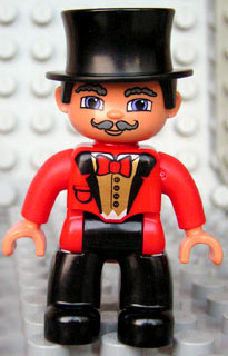Duplo Figure Lego Ville, Male Circus Ringmaster, Black Legs, Red Top with Bow Tie, Top Hat, Blue Eyes