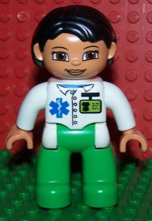 Duplo Figure Lego Ville, Female, Medic, Bright Green Legs, White Top with ID Badge and EMT Star of Life Pattern, Black Hair, Brown Eyes