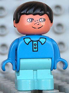 Duplo Figure, Child Type 1 Boy, Light Blue Legs, Blue Top With Collar And 2 Buttons, Black Hair