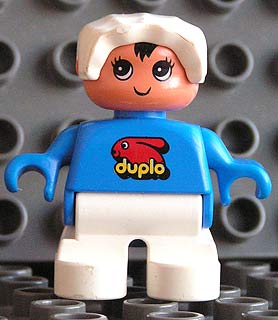Duplo Figure, Child Type 2 Baby, White Legs, Blue Top with Duplo Bunny Logo, White Bonnet