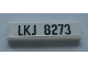 Part No: 2431pb0096 Name: Tile 1 x 4 with Black 'LKJ 8273' on White Background Pattern (Sticker) - Set 8273 Part No: 2431pb0096 Name: Tile 1 x 4 with Black 'LKJ 8273' on White Background Pattern (Sticker) - Set 8273