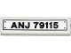 Lego part: Tile 1 x 4 with Black 'ANJ 79115' Pattern (Sticker) - Set 79115