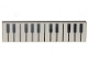 Part No: 2431pb593  Name: Tile 1 x 4 with Black and White Piano Keys Pattern