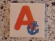 Lot ID: 397465087  Part No: 3068pb0710  Name: Tile 2 x 2 with Letter A Red with Anchor Pattern