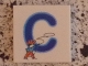 Lot ID: 397465362  Part No: 3068pb0712  Name: Tile 2 x 2 with Letter C Blue with Cowboy Pattern