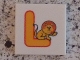 Lot ID: 397466058  Part No: 3068pb0721  Name: Tile 2 x 2 with Letter L Yellow with Lion Pattern