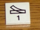 Lot ID: 327577423  Part No: 3068pb2440  Name: Tile 2 x 2 with Black Train Track Switch Point Right and Number 1 Pattern