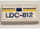 Part No: 3069pb1394 Name: Tile 1 x 2 with Dark Blue and Yellow Stripes, Brick and 'LDC-812' Pattern (Sticker) - Set 40468 Part No: 3069pb1394 Name: Tile 1 x 2 with Dark Blue and Yellow Stripes, Brick and 'LDC-812' Pattern (Sticker) - Set 40468