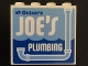 Part No: 60581pb046  Name: Panel 1 x 4 x 3 with Side Supports - Hollow Studs with 'Octan's JOE'S PLUMBING' and Light Blue Drainpipe Pattern (Sticker) - Set 70811