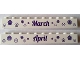 Part No: 6111pb016  Name: Brick 1 x 10 with Dark Purple 'March' and 'April' on Opposite Sides Pattern