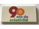 Lot ID: 413749816  Part No: 87079pb1150  Name: Tile 2 x 4 with '90 ans de créativité' Pattern