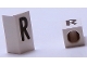 Part No: bb0695pb36  Name: Tile, Modified 1 x 2 x 5/6 Stud Hole in End with Black Capital Letter R Pattern