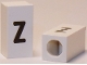 Part No: bb0695pb70  Name: Tile, Modified 1 x 2 x 5/6 Stud Hole in End with Black Lowercase Letter z Pattern