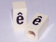 Part No: bb0695pb83  Name: Tile, Modified 1 x 2 x 5/6 Stud Hole in End with Black Lowercase Letter e with Circumflex (ê) Pattern