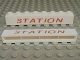 Part No: crssprt01pb18  Name: Brick 1 x 8 without Bottom Tubes with Cross Side Supports with Red 'STATION' Pattern