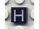 Lot ID: 55607367  Part No: 3070pb016  Name: Tile 1 x 1 with Silver Capital Letter H Pattern