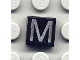 Lot ID: 331405244  Part No: 3070pb021  Name: Tile 1 x 1 with Silver Capital Letter M Pattern