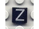 Lot ID: 68283123  Part No: 3070pb034  Name: Tile 1 x 1 with Silver Capital Letter Z Pattern