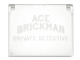 Part No: 60603pb004  Name: Glass for Window 1 x 4 x 3 - Opening with 'ACE BRICKMAN PRIVATE DETECTIVE' Pattern