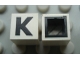 Part No: Mx1011Bpb11  Name: Modulex, Tile 1 x 1 with Black 'K' Pattern (with black lining on sides only)