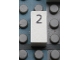 Part No: Mx1021Apb22  Name: Modulex, Tile 1 x 2 with Black Calendar Day Number  '2' Pattern