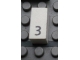 Lot ID: 407657621  Part No: Mx1021Apb23  Name: Modulex, Tile 1 x 2 with Black Calendar Day Number  '3' Pattern