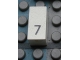 Part No: Mx1021Apb27  Name: Modulex, Tile 1 x 2 with Black Calendar Day Number  '7' Pattern